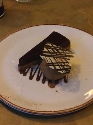 The vegan option for dessert with a silky and rich chocolate-orange tort with coffee ice cream! at The Walrus in Brighton