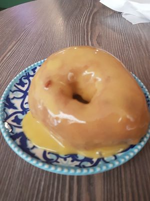 Passion fruit glazing at Daddy Donut x Churros Cartel in The Hague