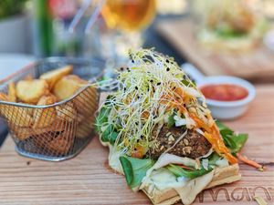 Fishburger on a waffle at Manna 68 in Gdansk