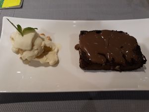 Vegan brownie and vanilla ice cream. at Manna 68 in Gdansk