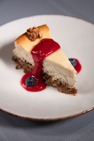 Walnut Cheesecake with homemade Strawberry Coulis at Manna 68 in Gdansk