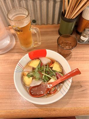 Had the one with more veggies in it. Had a more liquid broth and a ton of oil (you can see the oil, floating in this picture). I liked the other one better.  at Soranoiro Nippon in Tokyo