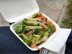 Red rice cooked with coconut milk, veges and curry tofu at Vegan for Longevity & Health in Auckland