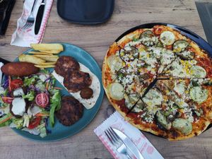 Mixed plate and pizza at Vegan House in Antalya