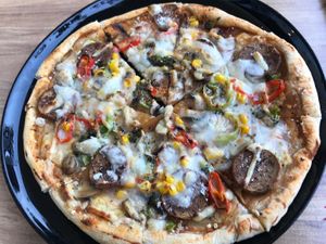 Faulty pizza with no tomato sauce at Vegan House in Antalya