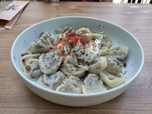 Yummy manti stuffed with soy meat and topped with yogurt at Vegan House in Antalya