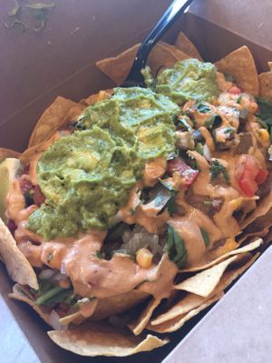 Nachos with chicken and chipotle salsa. Enough para tres personas! at Vegan GreenGO in Santa Barbara