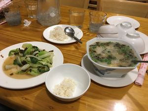 Right: the rice porridge. Left: the stir-fried roots, vegetables etc at Chay Con Dao Healthy in Con Dao
