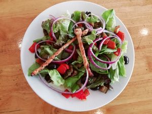 Summer salad : Lettuce, grilled eggplants, zucchinis and peppers, black olives and red onions - 160 thb at Make It Pizza and Salad in Koh Phangan