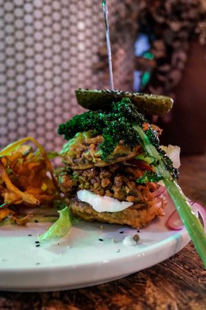 Mushroom burger made with tempura mushroom as the 'buns' at Greenhouse Canteen & Bar in South Brisbane