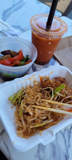 Vegan tofu pad Thai, eggplant side, and vegan Thai tea. at Kittiwat Thai Kitchen in Frederick