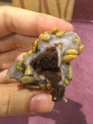 inside the purple dumpling thing, red bean with sunflower seeds outside! at LianChi Ge in Taipei