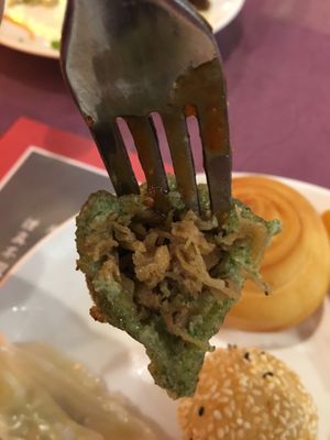 inside the green dumpling, cabbage and mushroom I think at LianChi Ge in Taipei