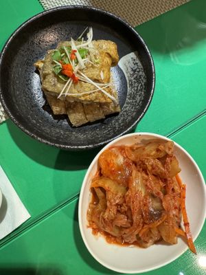 must try : glutinous rice & kimchi   at Meimen FángKōngDòng 梅門防空洞 in Taipei