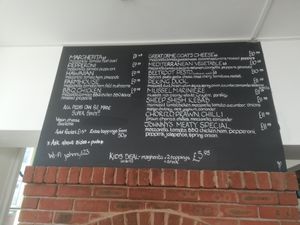 Menu board at Johnny Dough's at The Bridge in Conwy