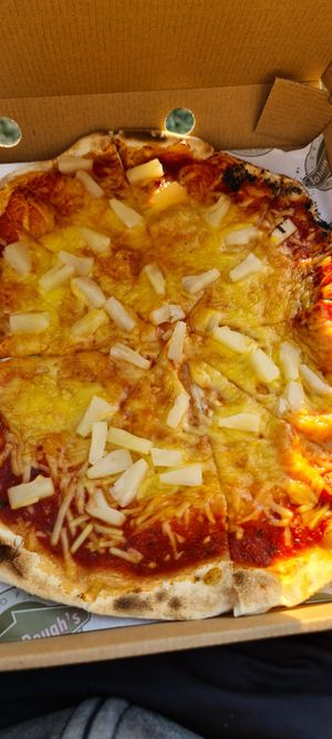 Vegan cheese pineapple pizza at Johnny Dough's at The Bridge in Conwy