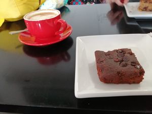 Flat white and brownie at Prana Cafe in Leicester