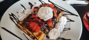 Waffles with strawberry and chocolate hazelnut at Prana Cafe in Leicester