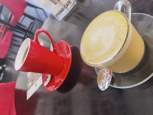 Coffee, Turmeric latte ❤️ waffles and pancakes ❤️ at Prana Cafe in Leicester