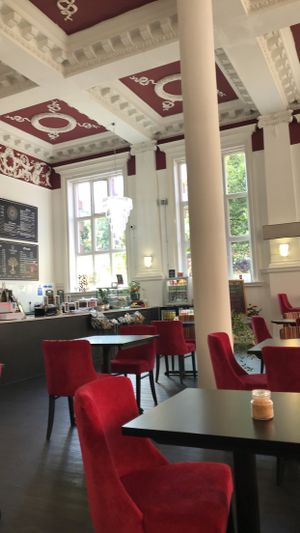 Interior of Prana Cafe (old bank) with vegan chocolate bars, sandwiches and Booja Booja ice cream  at Prana Cafe in Leicester