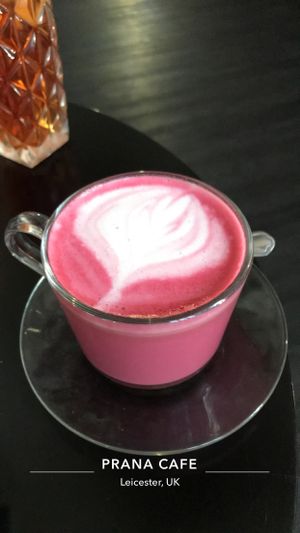 Beetroot latte with almond milk. at Prana Cafe in Leicester