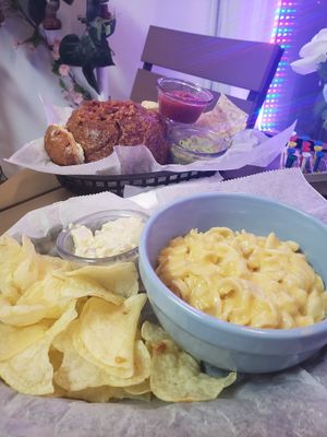Mac and cheese, chips, and potato salad (front); chilli in a bread bowl with chips, salsa, and guac (back) at Bread Bowl Cafe in Milford