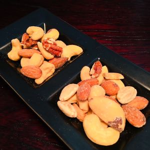 Brazil, macadamia, pecan, cashews and almonds, roasted & salted. Perfect with a beer. at D'Vine Restaurant & Lounge in Nikko