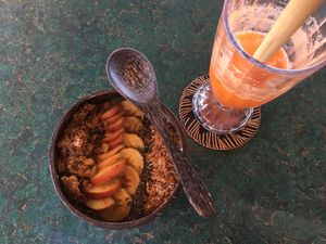 Tropical smoothie bowl and carrot juice at Indiana vegan Cafe & Yoga in Langkawi