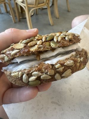 Seeded rye bun with vegan cream cheese  at Bake My Day in Copenhagen