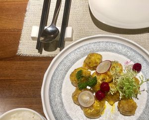 Mustard laced lotus balls at Elefant BaoPu Vegetarian in Dalian