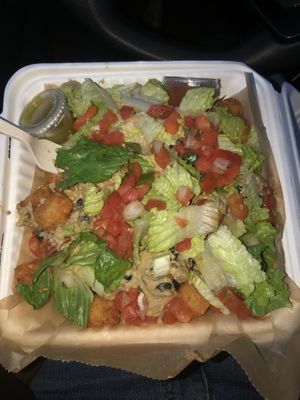 These were DELICIOUS!!!!!!!!   These are the vegan nacho tater tots.  It was ALOT and scrumdiddlyumtious.    This is a must try.  at Kayak Kafe - Midtown in Savannah