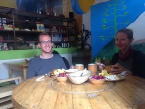 Plato tipico vegetariano (chucchucaras vegetarianas) empanada, mote, canguil, papas al horno, chicharron de carne vegetarian, plátano, maíz tostado,  ensalada de verduras, chicha at KIPI Natural in Latacunga