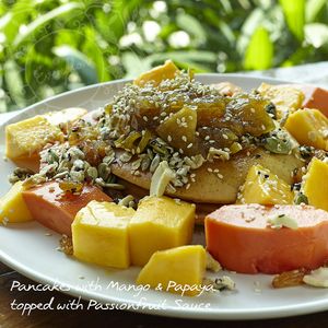 Homemade Pancake with Mango + Papaya topped with Passionfruit Sauce at Everflow in Koh Chang