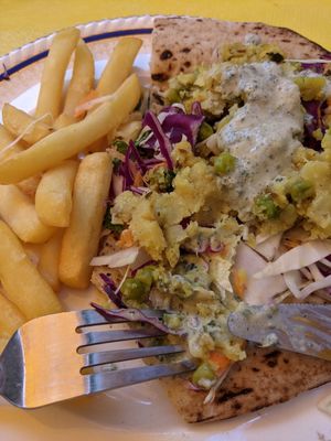 Naan bread savoury main with chips at Karmic Cakery in Berwick-upon-tweed