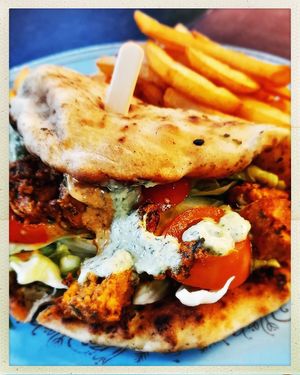 Karmic Tandoori style chicken, salad and mint sauce naan bread wrap.  at Karmic Cakery in Berwick-upon-tweed