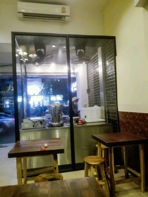 Inside looking out at Falafel Michelin in Bangkok