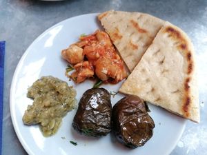 Dolmades, flatbread, aubergine, jackfruit stifado at The Real Greek - Covent Garden in London