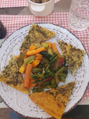 Farinata and vegetables at Centro Botanico in Milan