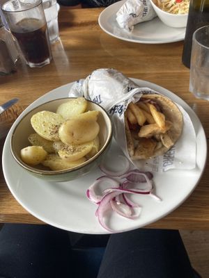 Plant ‘chicken’ wrap with new potatoes! 😃  at The Real Greek in Southampton