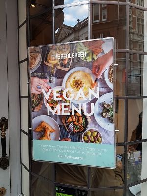 ad for vegan menu at The Real Greek - St. Martin's Lane in London