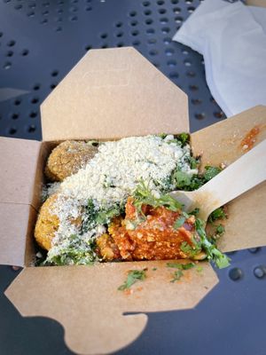 Lentils, black rice, mixed sweet potato and green balls, several toppings .  at Turlaj Klopsa - Food Truck Ruczaj in Krakow