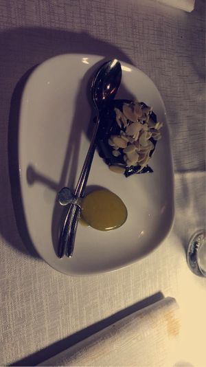 Vegan cocoa pudding with almonds and mango-orange-salsa  at Be Bop in Milan