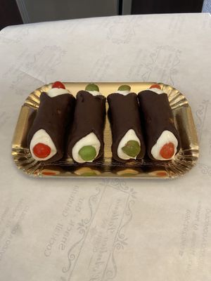 Vegan cannoli with vegan orange scented cream filling   at Antica Latteria in Messina