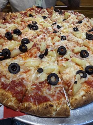 Vegan mozzarella, pineapple and olives. Pretty good, just needed a little salt to boost the flavors   at Blue Dog Gourmet Pizza in South Lake Tahoe
