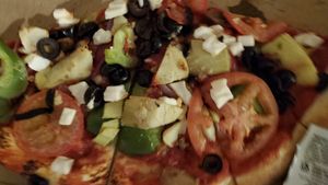 Practically no vegan cheese coverage. at Blue Dog Gourmet Pizza in South Lake Tahoe