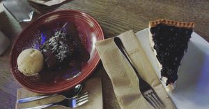 Brownie with vanilla ice cream and cheesecake with blueberries at Zeil Kitchen in Frankfurt