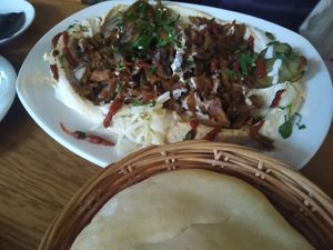 Mushroom and zeitan shawarma on hummus at Zeil Kitchen in Frankfurt