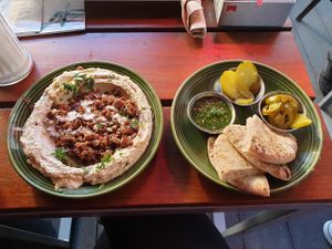 Hummus with Beyond meat, pita with pickles at Zeil Kitchen in Frankfurt