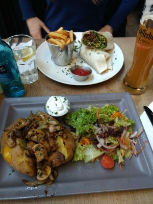 Beyond wrap and baked potato with mushrooms  at Zeil Kitchen in Frankfurt
