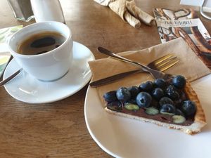 blueberry cake with coffee at Zeil Kitchen in Frankfurt